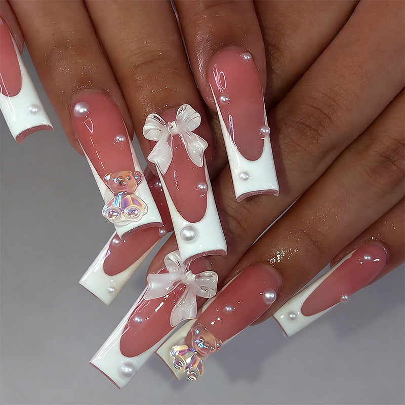 Artificial nail set with elegant bow and pearl decorations Bowlift