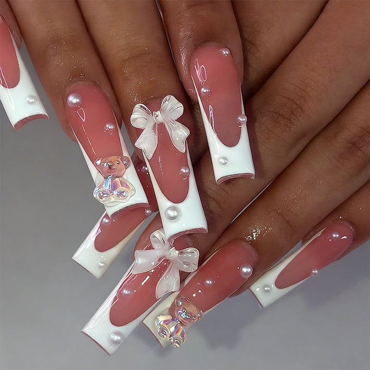 Artificial nail set with elegant bow and pearl decorations Bowlift