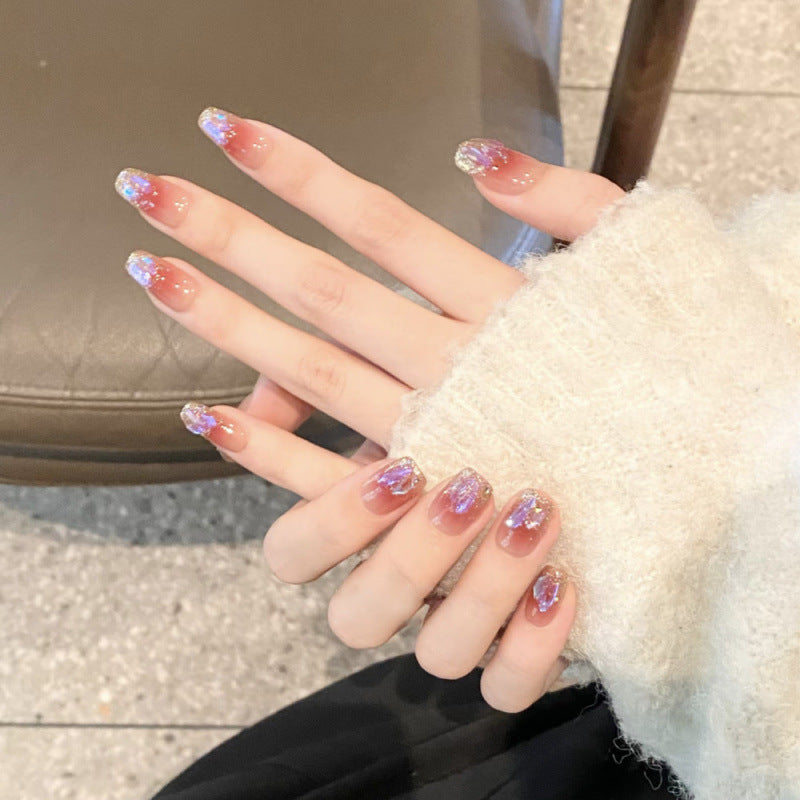 Glamorous artificial nails with glitter effects Bowlift