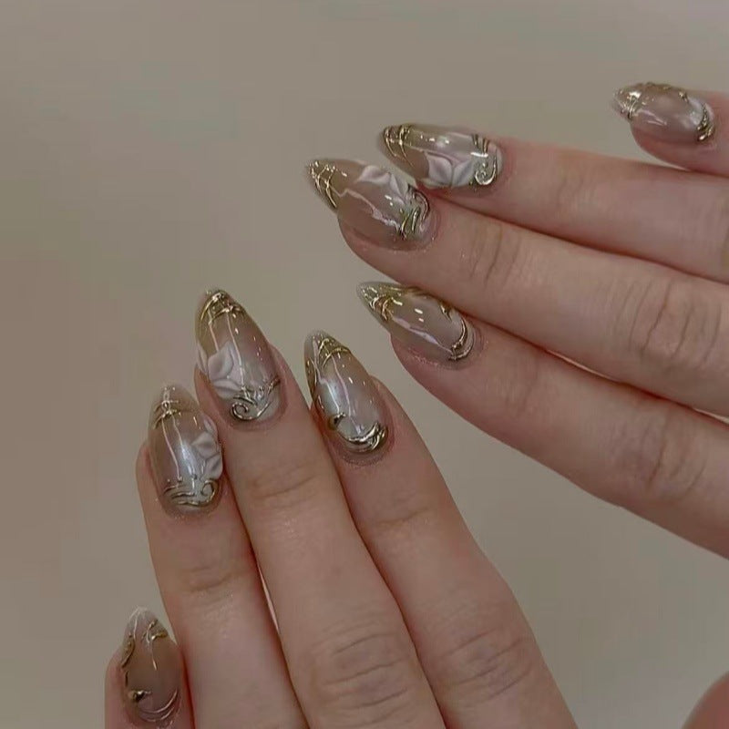 Elegant artificial nails with marble and gold accents Bowlift