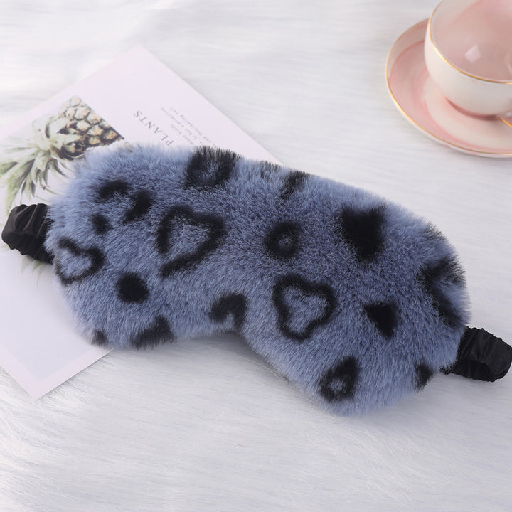 Women's cuddly faux fur sleep mask with heart-embossed surface and gathered comfort band Bowlift