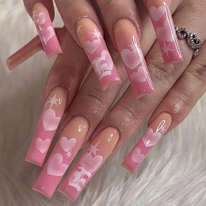 Artificial nail art with heart patterns Bowlift