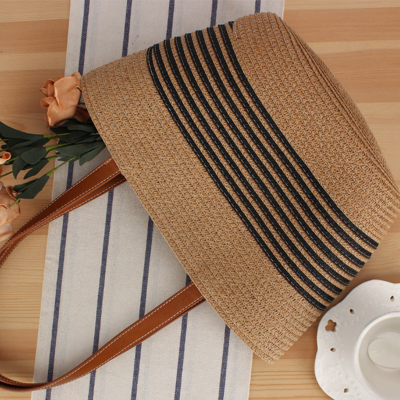 Beach bag with braided pattern and elegant leather handles Bowlift