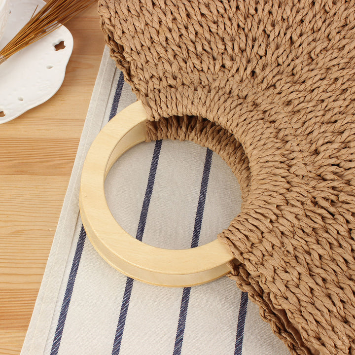 Designer bag made of hand-woven wicker with wooden handle Bowlift