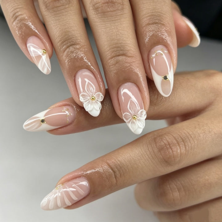 Artificial nails with elegant flower design and glitter accents Bowlift