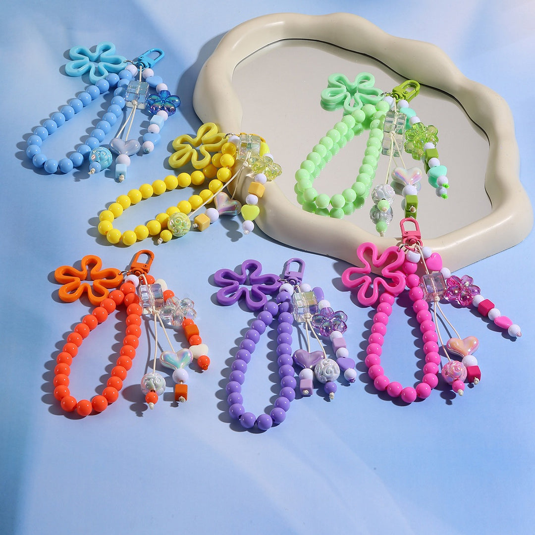 Playful keychain with flower and butterfly details Bowlift