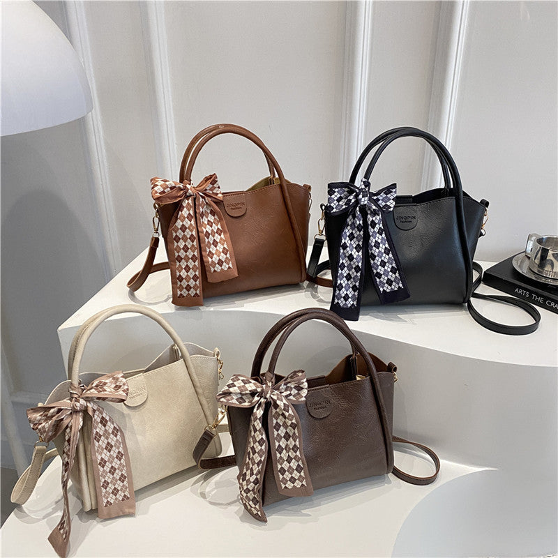 Elegant Bow Accent Handbag Bowlift