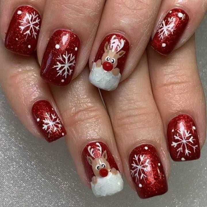 Creative artificial nails with festive reindeer design Bowlift