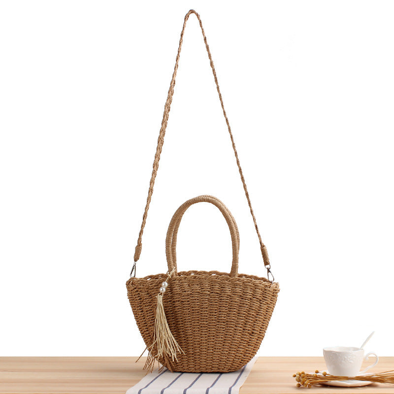 Braided crossbody bag with tassel decoration Bowlift