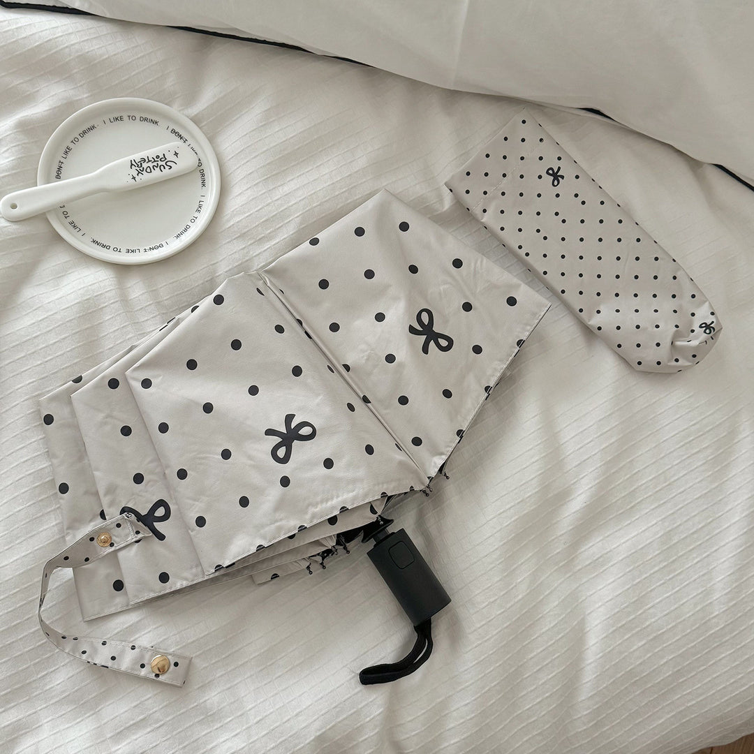 Ladies compact umbrella with stylish polka dot design Bowlift
