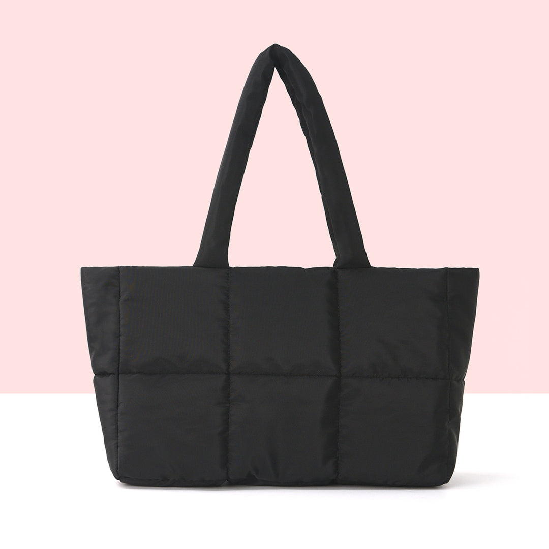 Padded carrying bag with modern quilted design Bowlift