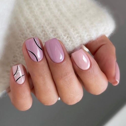 Artistic Nail Design with Glitter Accents Bowlift