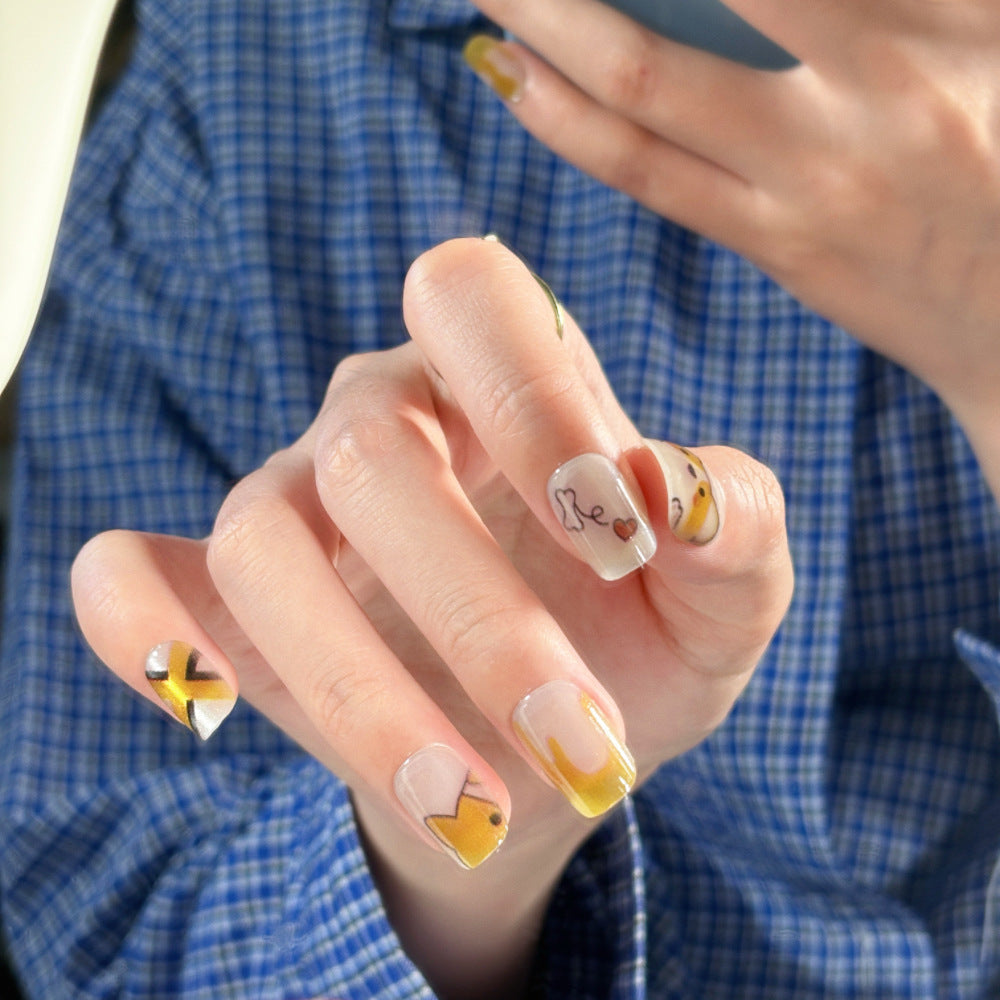 Decorative Press-On Nail Extensions with Bow and Rhinestone Accents Bowlift