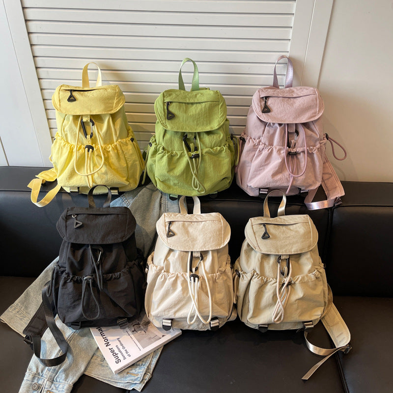Leisure backpack with elastic drawstring and practical side pockets Bowlift