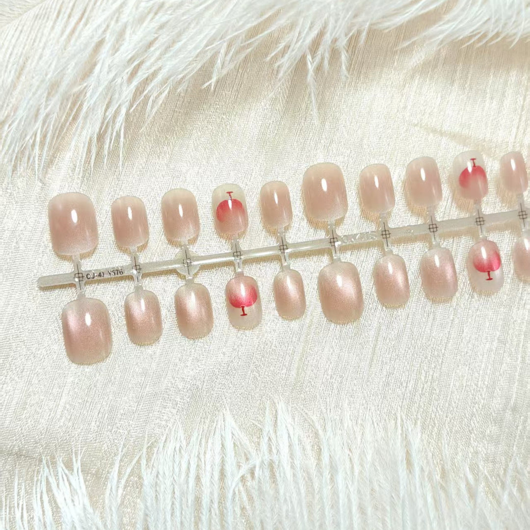 Elegant artificial nails with glitter and cocktail design Bowlift