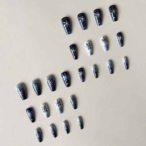 Nail art set with sparkling snowflakes and glitter accents Bowlift