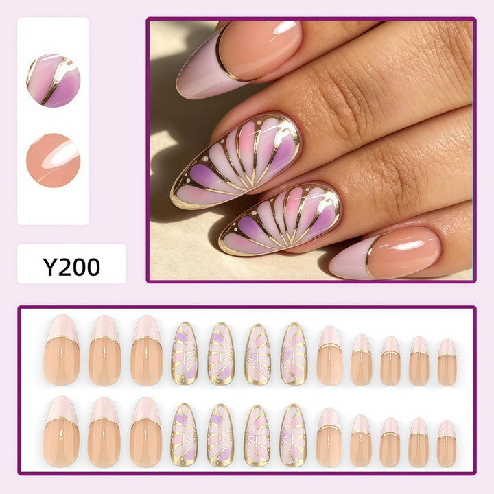 Artificial nails with luxurious gold edge and filigree design Bowlift