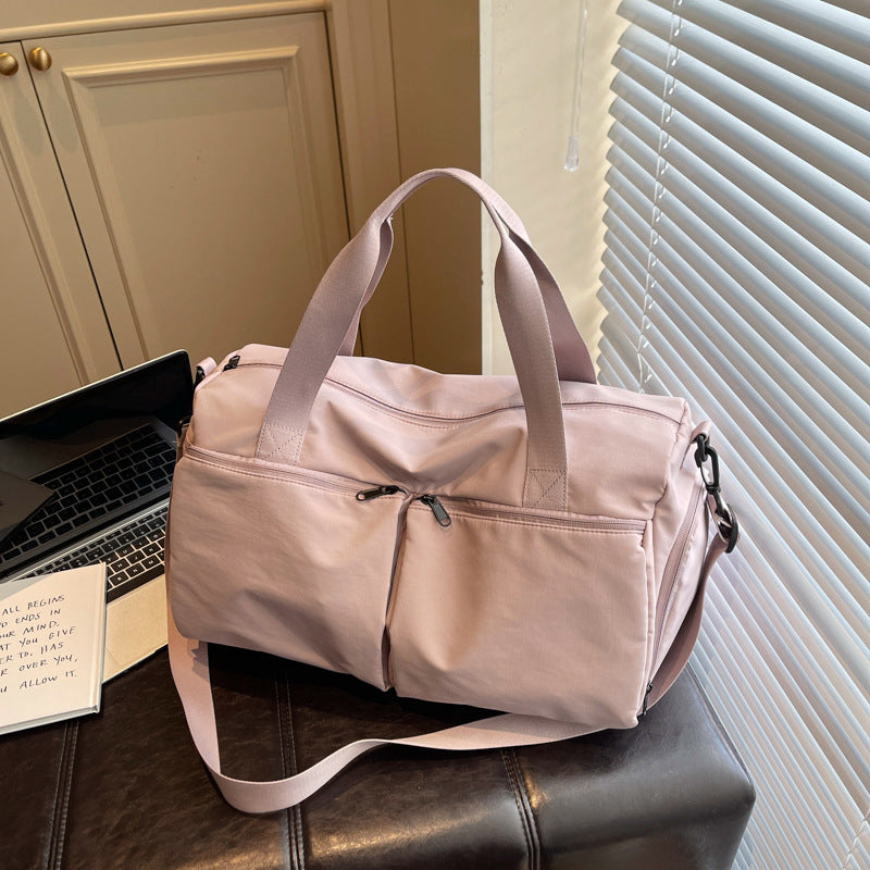 Sporty travel bag with expandable compartments Bowlift