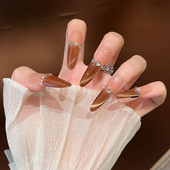 Artistic Stiletto Press-On Nail Art with Glimmering Accents Bowlift
