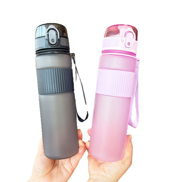 Ladies practical and leak-proof drinking bottle with integrated carrying strap Bowlift