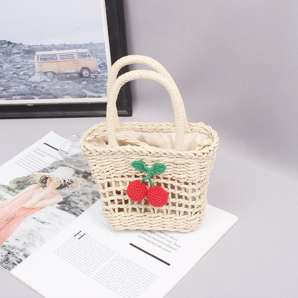 Basket bag with hand-knotted appliqués Bowlift