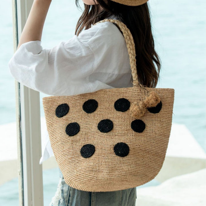 Handcrafted straw bag with eye-catching accents Bowlift