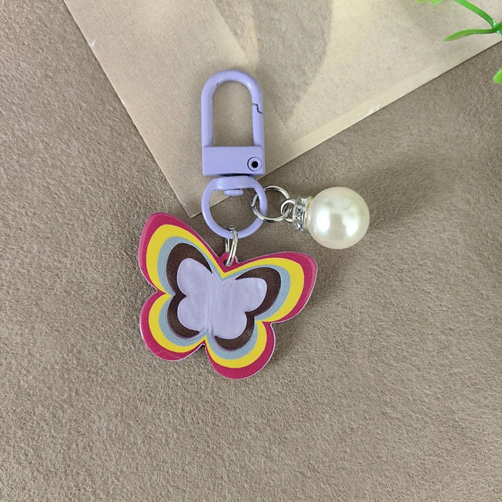 Keychain with butterfly and pearl accent Bowlift