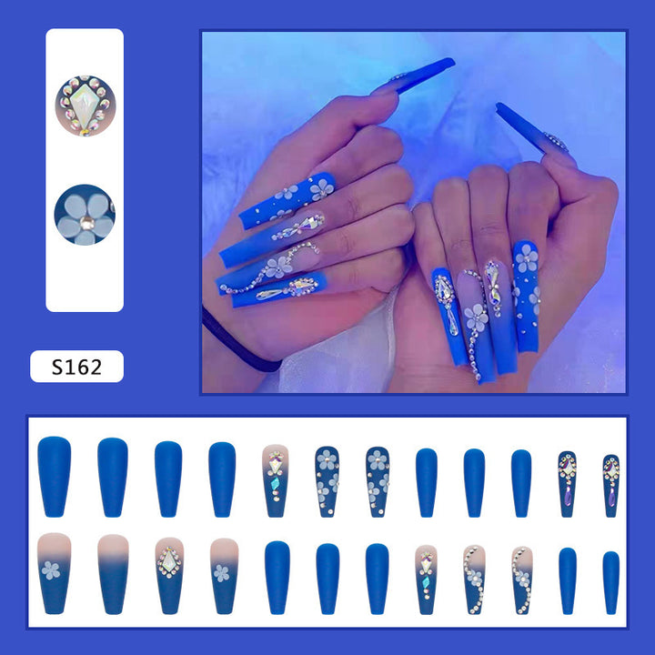 Nail art set with elegant 3D flower designs and glitter accents Bowlift