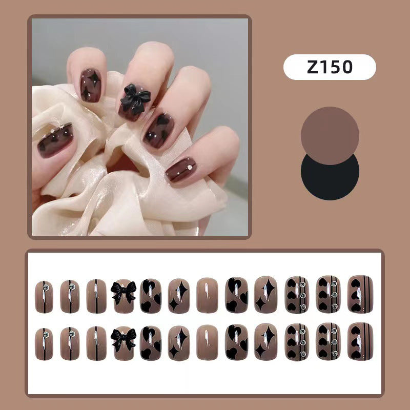 Artificial nails with elegant ribbon and heart designs Bowlift