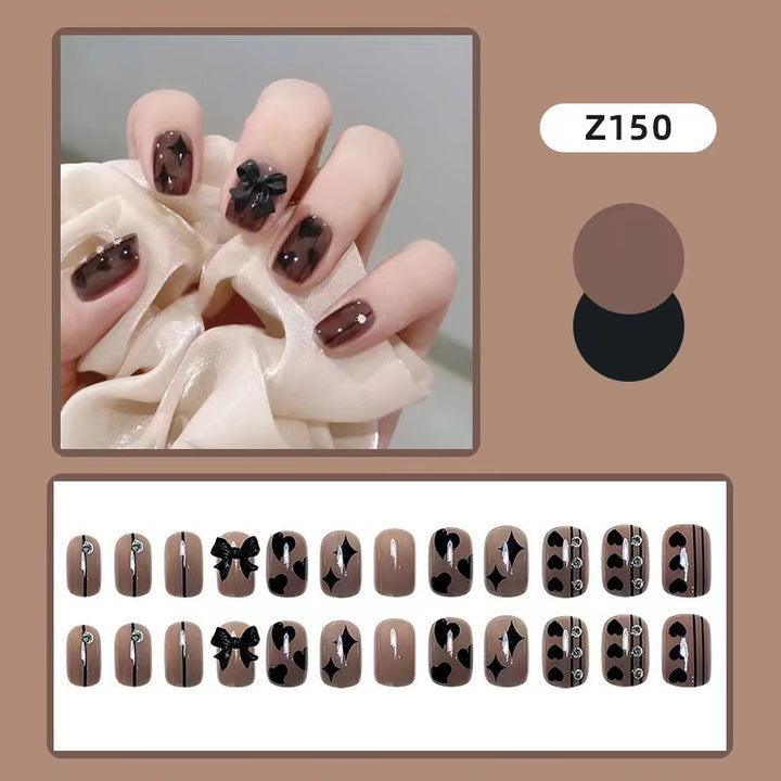 Artificial nails with elegant ribbon and heart designs Bowlift