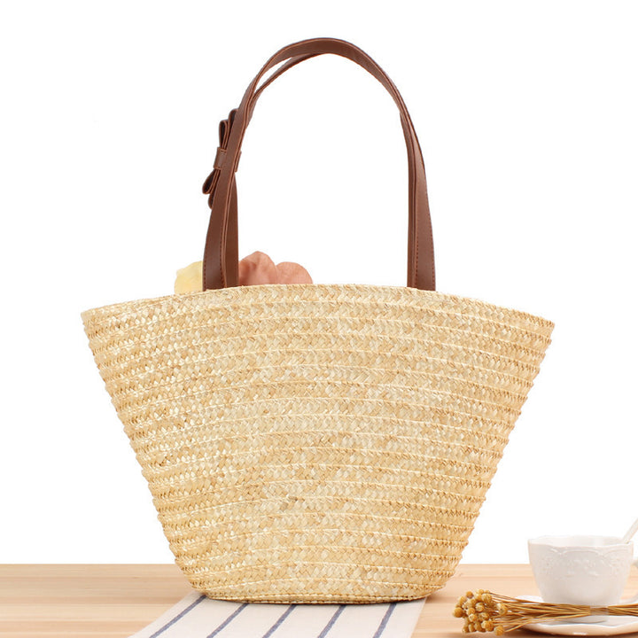 Beach bag with floral embellishments and stylish shoulder strap Bowlift