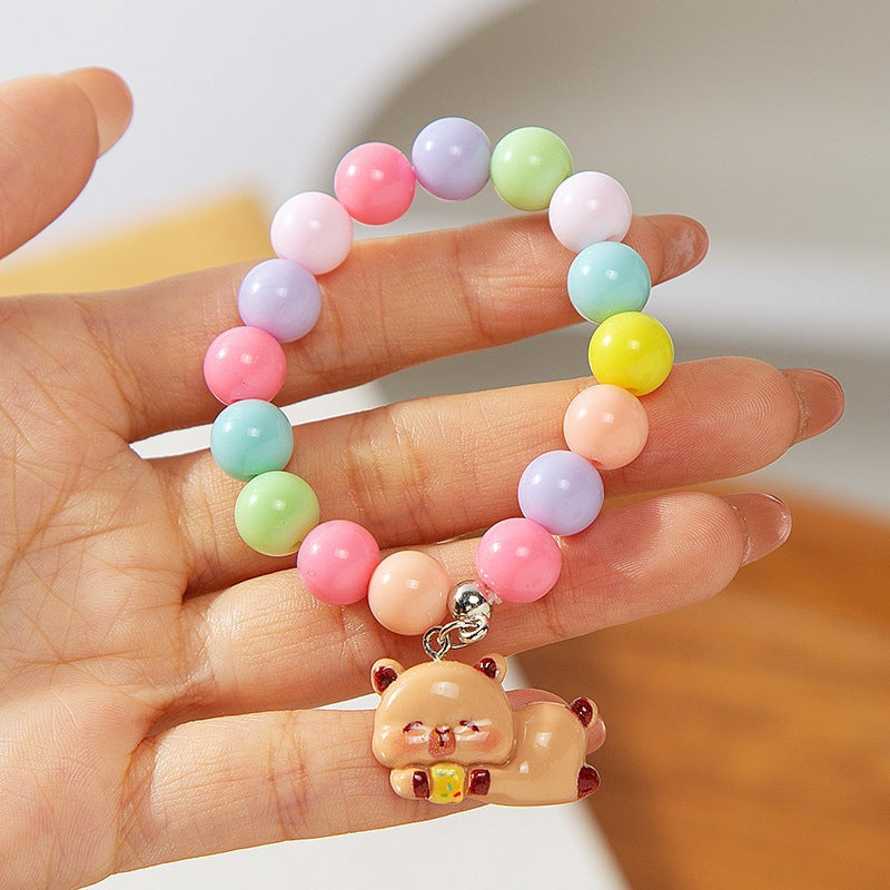 Colorful children's bracelet with crafted pendant Bowlift