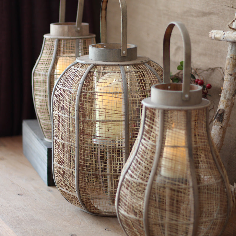 Rustic lantern made of braided natural material Bowlift