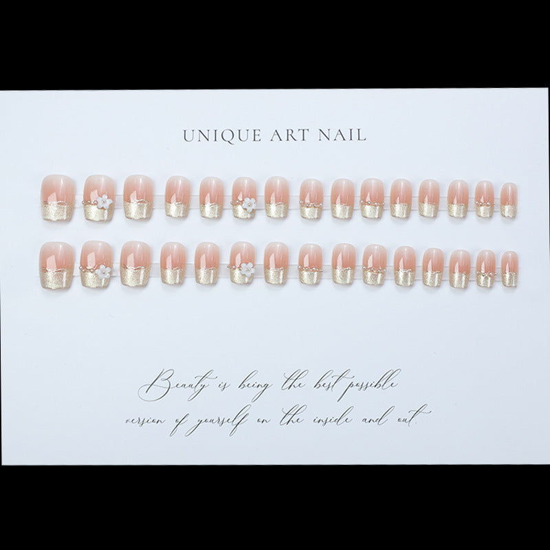 Decorative Press-On Nail Extensions with Floral Accents Bowlift