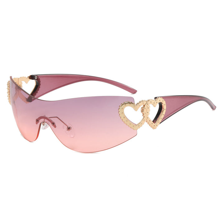 Ladies sporty sunglasses in trendy shield design with heart accents Bowlift