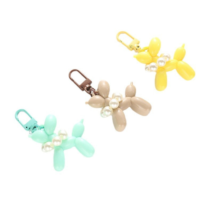 Playful keychain with balloon dog and beads Bowlift