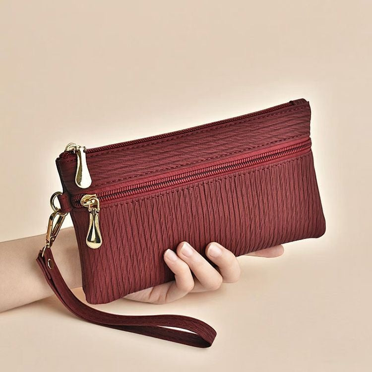 Elegant Clutch With Practical Wrist Strap Bowlift