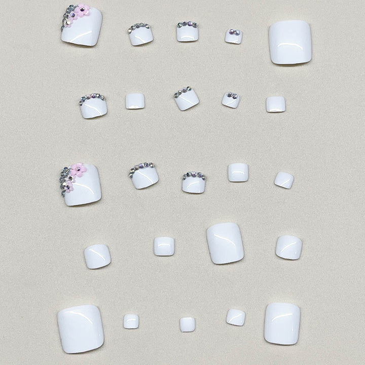 Nail art set with elegant glitter embellishments and floral accents Bowlift