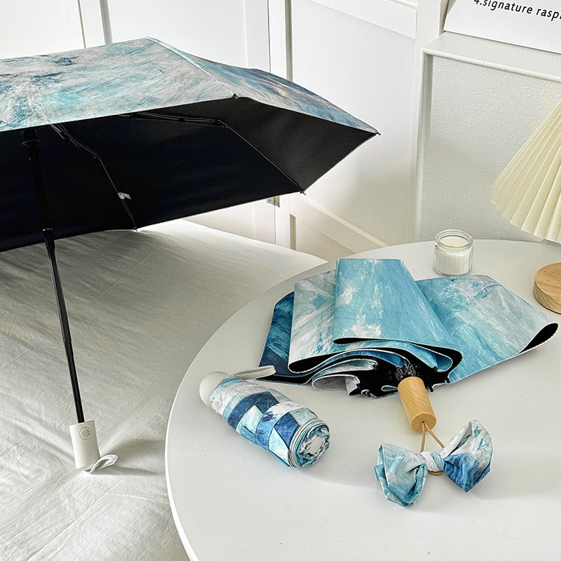 Ladies elegant folding umbrella with unique marble pattern Bowlift