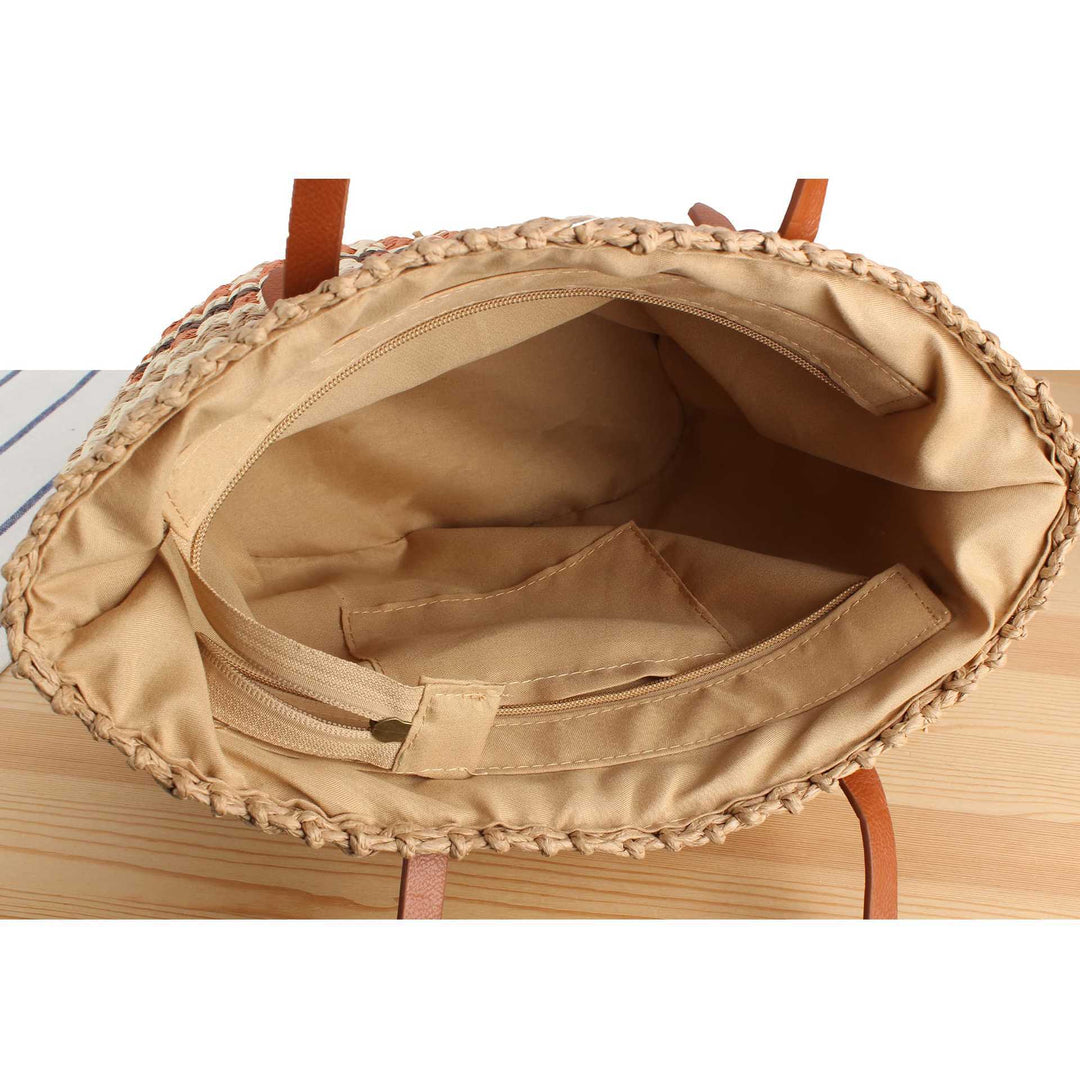 Tote bag made of braided natural material with elegant leather handles Bowlift