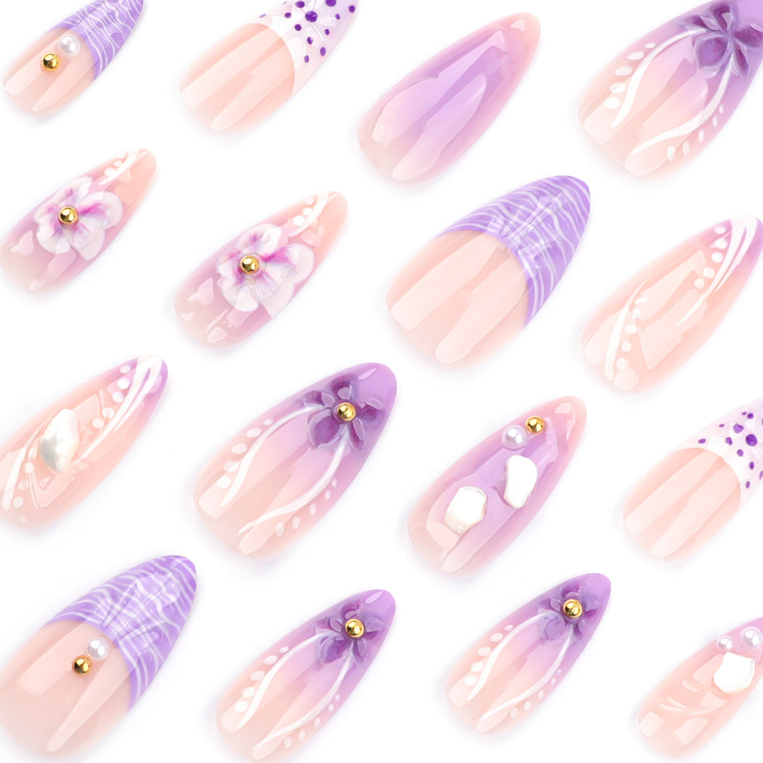 Artful nail extensions with elegant floral embellishments Bowlift