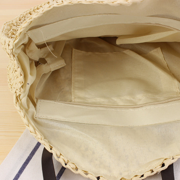 Round basket bag with sturdy leather handles Bowlift