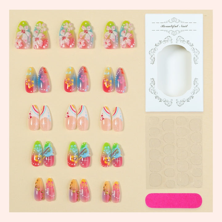 Artificial nail set with various designs and shiny embellishments Bowlift