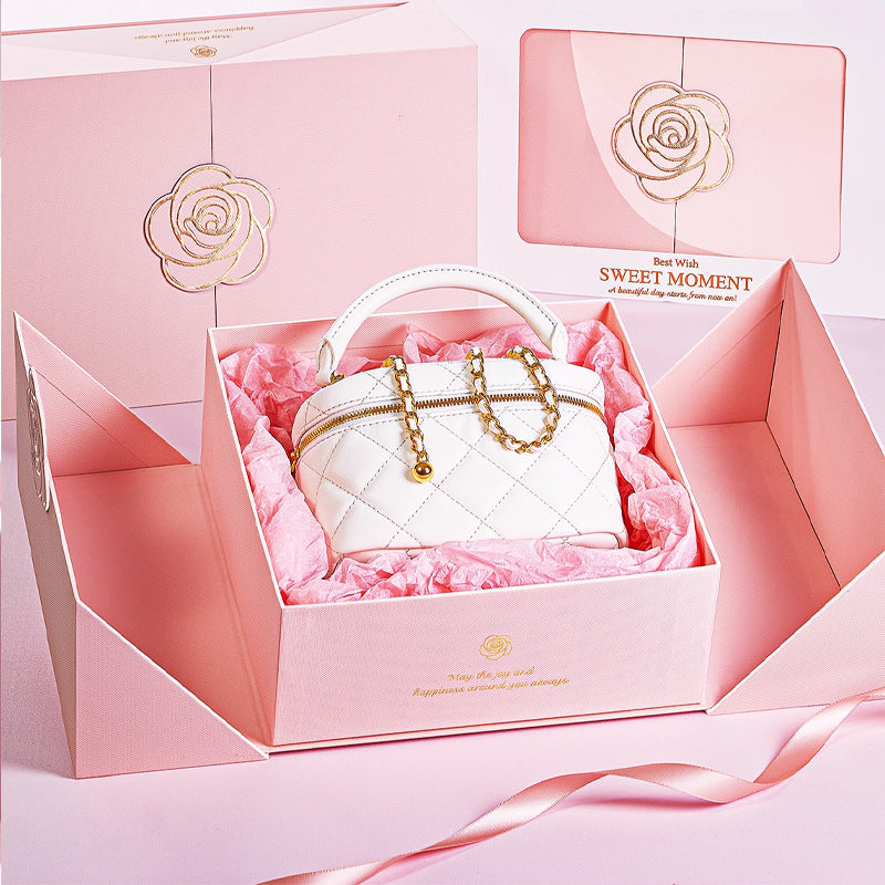 Luxurious rose-emblem gift box set with matching carry bag and magnetic closure Bowlift