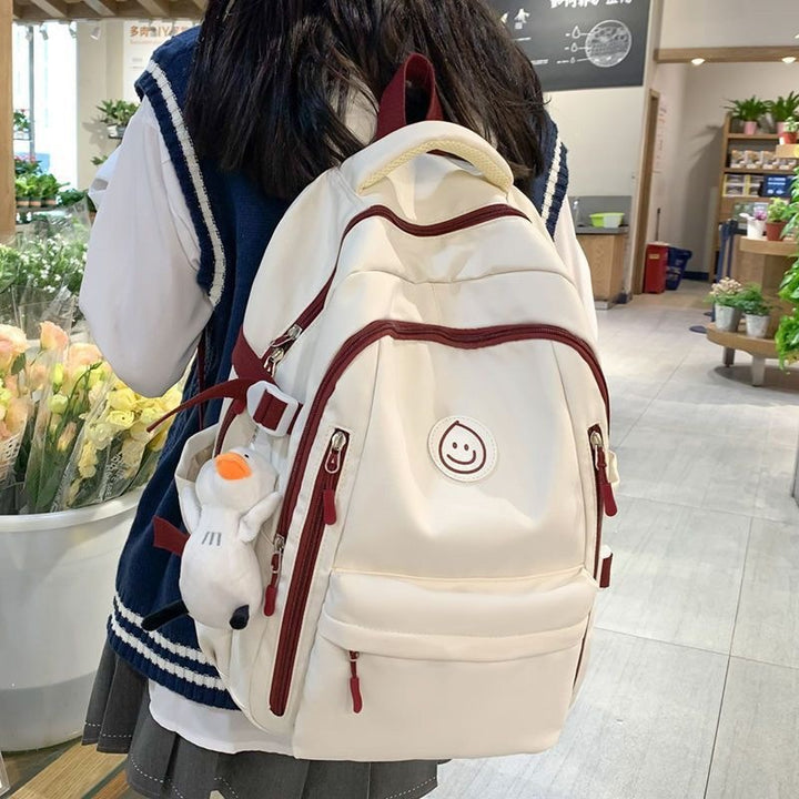Fashionable backpack with versatile compartments Bowlift