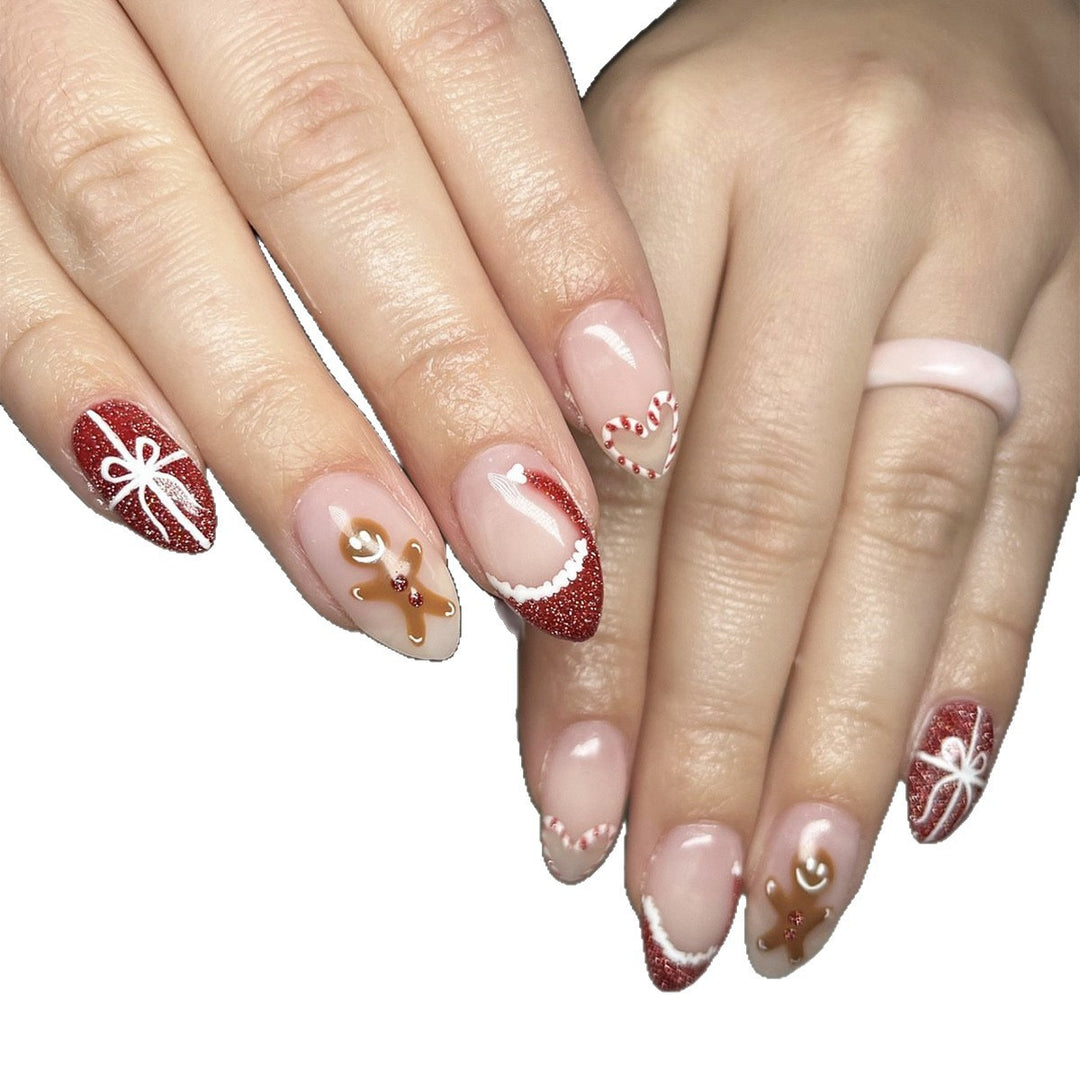 Artificial nail set with festive candy cane and gingerbread pattern Bowlift
