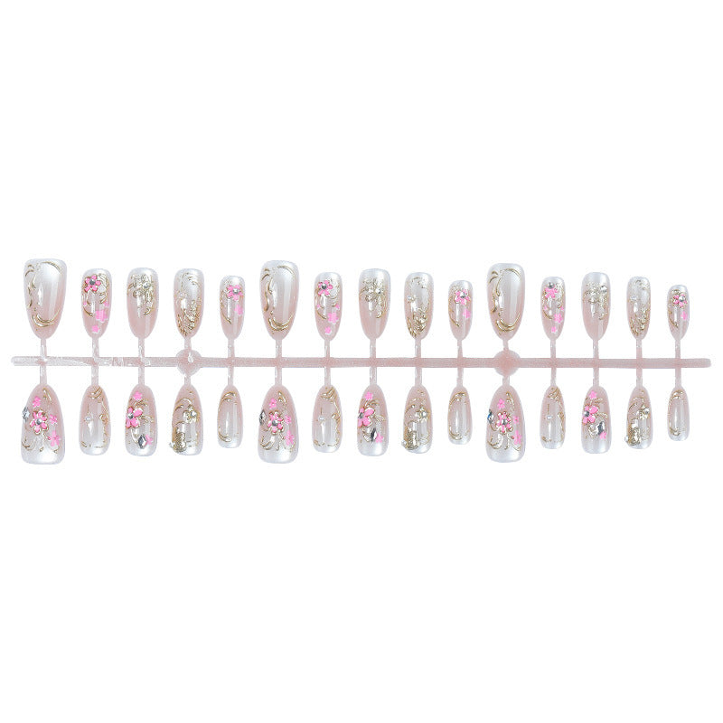Nail art set with floral and golden details Bowlift