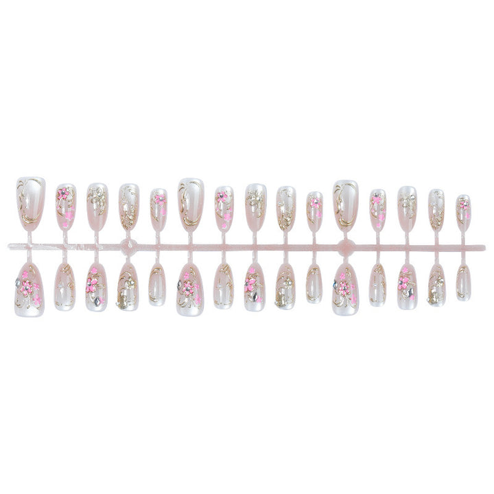 Nail art set with floral and golden details Bowlift