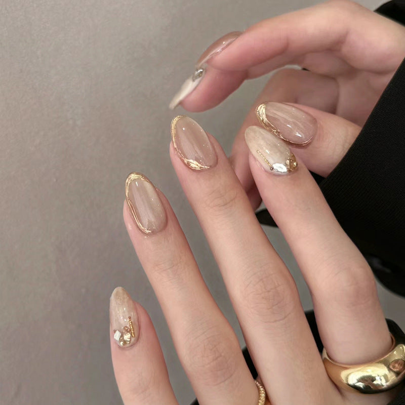 Elegant Glossy Press-On Nail Set with Gold Accents Bowlift