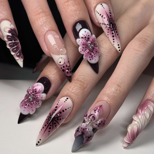 Artistic stiletto nails with floral 3D embellishments Bowlift